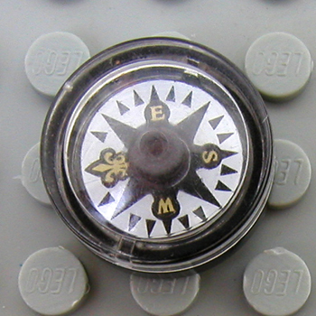 Sets that have x404c02: Minifig Compass with Fleur de Lis Pattern and Clear